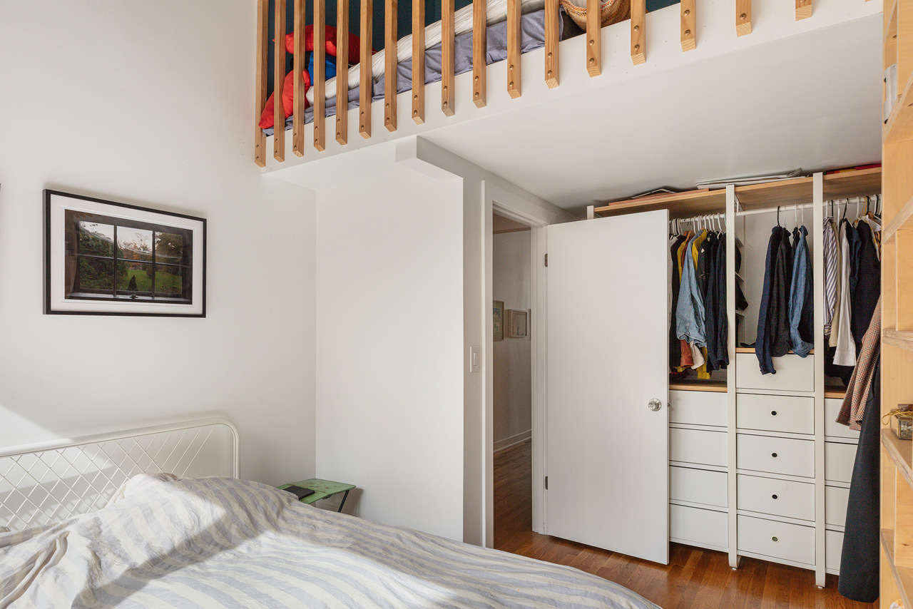 22 North Morgan Street, Unit 215 Chicago, IL 60607 - Photo 22 of 27 a bedroom with a bed and a window