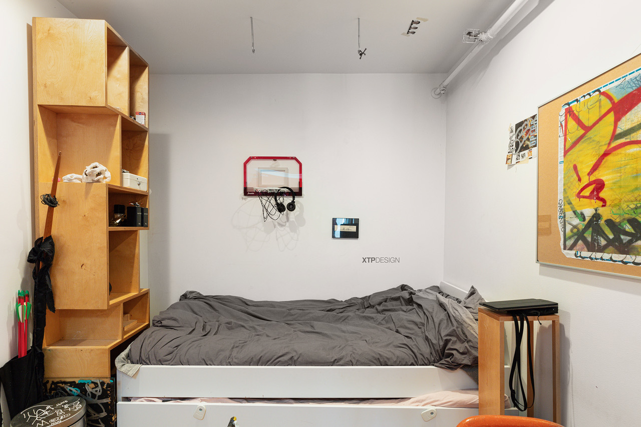 22 North Morgan Street, Unit 215 Chicago, IL 60607 - Photo 25 of 27 a bedroom with a bed and a painting on the wall