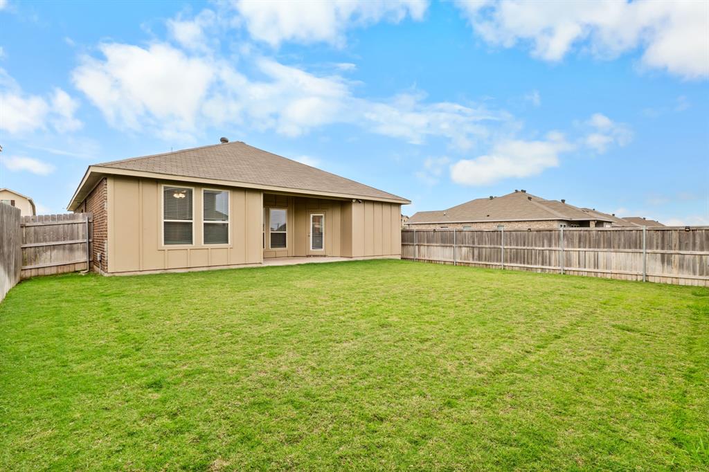 11233 Solar Street Lorena, TX 76655 - Photo 22 of 33 back yard and covered back porch