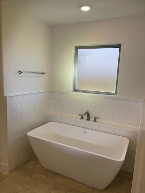 141 Joel Street Springtown, TX 76082 - Photo 18 of 21 a white bath tub sitting in a bathroom