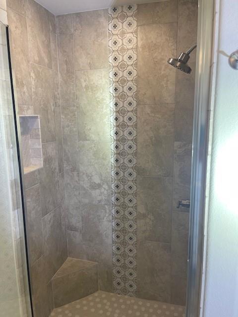 141 Joel Street Springtown, TX 76082 - Photo 19 of 21 a bathroom with a shower