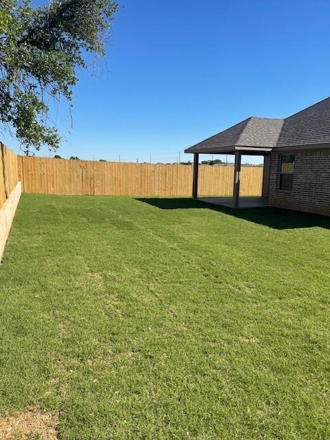 141 Joel Street Springtown, TX 76082 - Photo 4 of 21 a view of a backyard