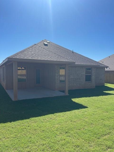 141 Joel Street Springtown, TX 76082 - Photo 5 of 21 a house with garden in front of it
