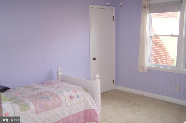 9920 Pepper Hill Road Perry Hall, MD 21128 - Photo 11 of 20 a bedroom with a bed and a window