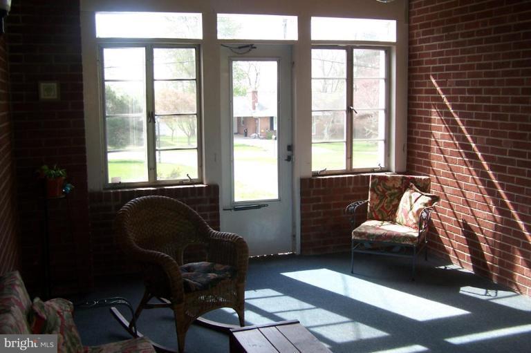 9920 Pepper Hill Road Perry Hall, MD 21128 - Photo 16 of 20 a living room with furniture and a large window
