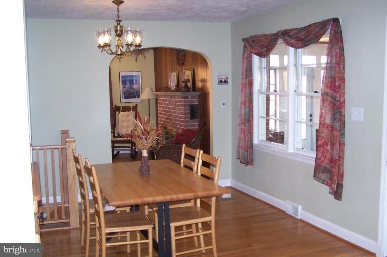 9920 Pepper Hill Road Perry Hall, MD 21128 - Photo 5 of 20 a view of a dining room with furniture and chandelier