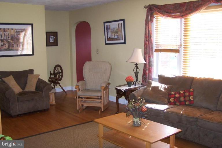 9920 Pepper Hill Road Perry Hall, MD 21128 - Photo 6 of 20 a living room with furniture chess board and a window