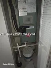 a bathroom with a toilet and a sink