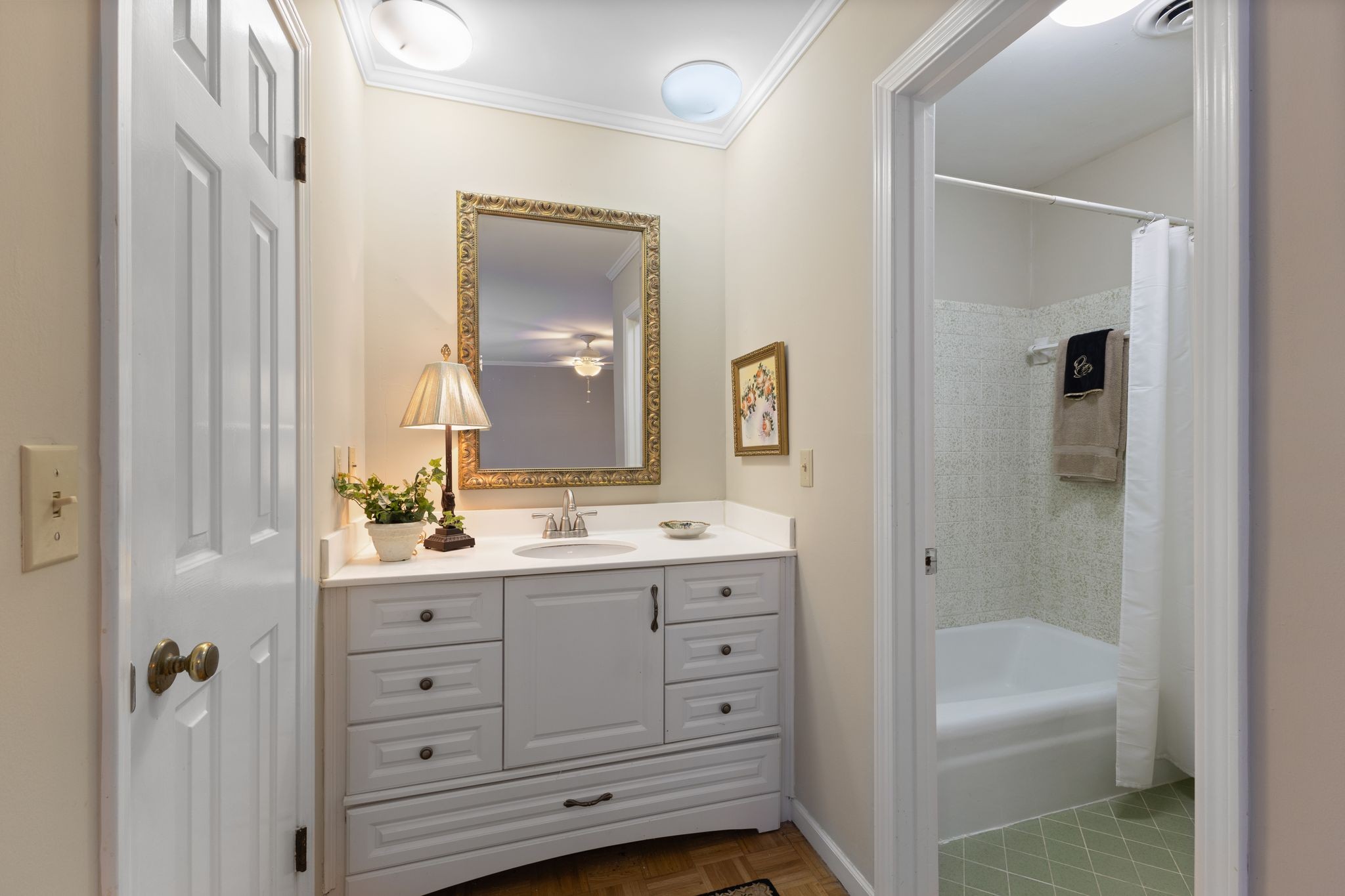8207 Sawyer Brown Road, Unit M1 Nashville, TN 37221 - Photo 15 of 25 a bathroom with a tub a sink and mirrors
