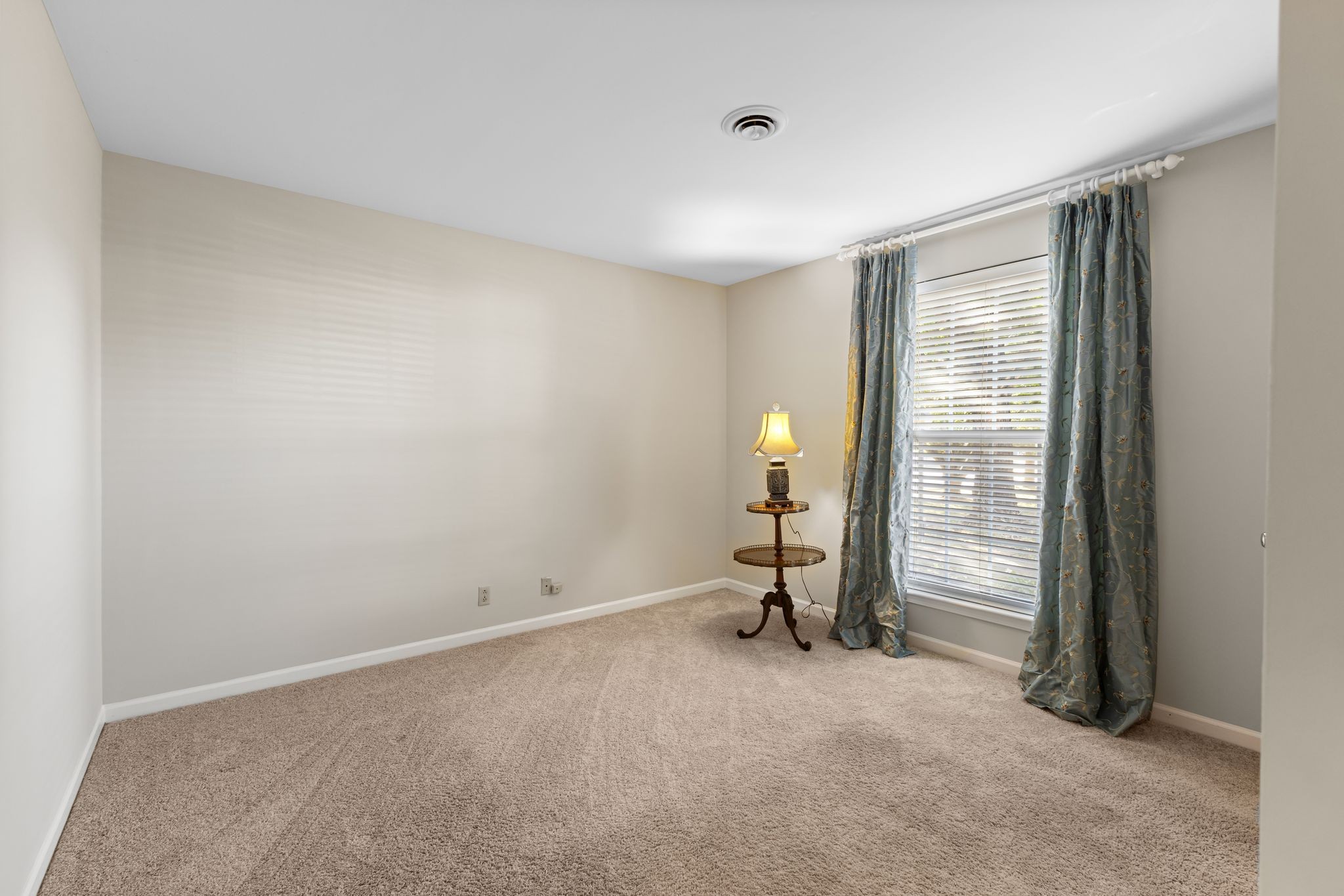 8207 Sawyer Brown Road, Unit M1 Nashville, TN 37221 - Photo 16 of 25 a view of a room with air conditioner and window