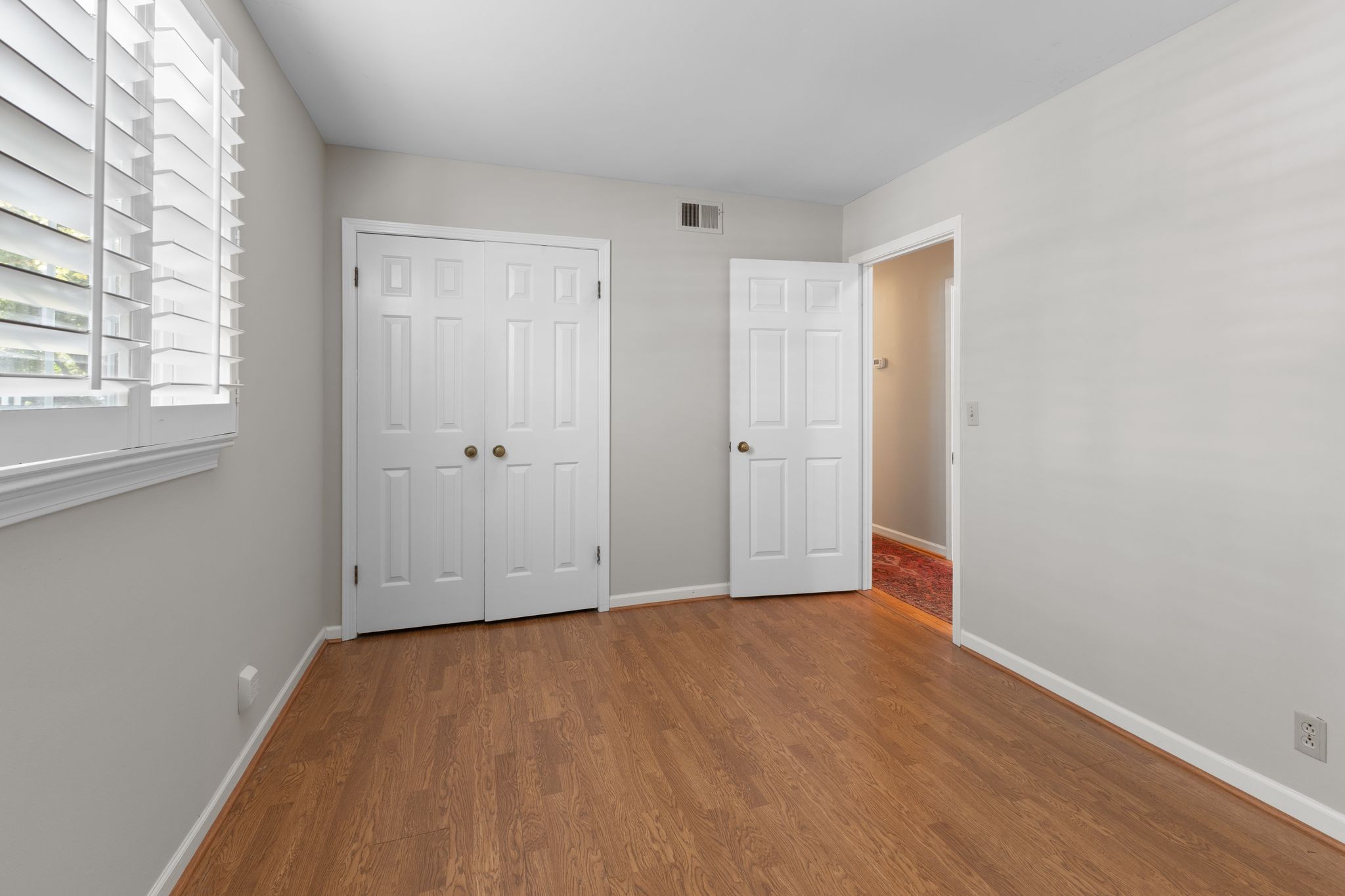 8207 Sawyer Brown Road, Unit M1 Nashville, TN 37221 - Photo 19 of 25 wooden floor in an empty room