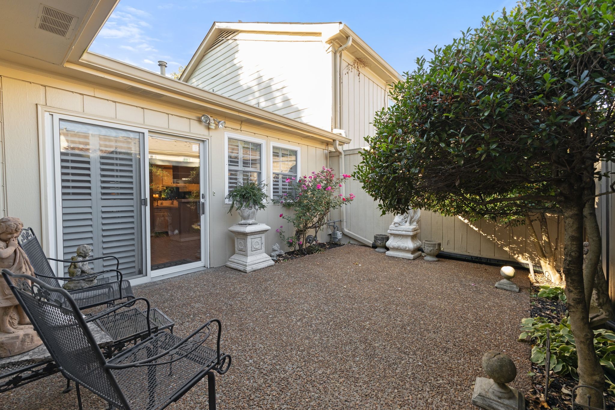 8207 Sawyer Brown Road, Unit M1 Nashville, TN 37221 - Photo 22 of 25 a view of a house with backyard and sitting area
