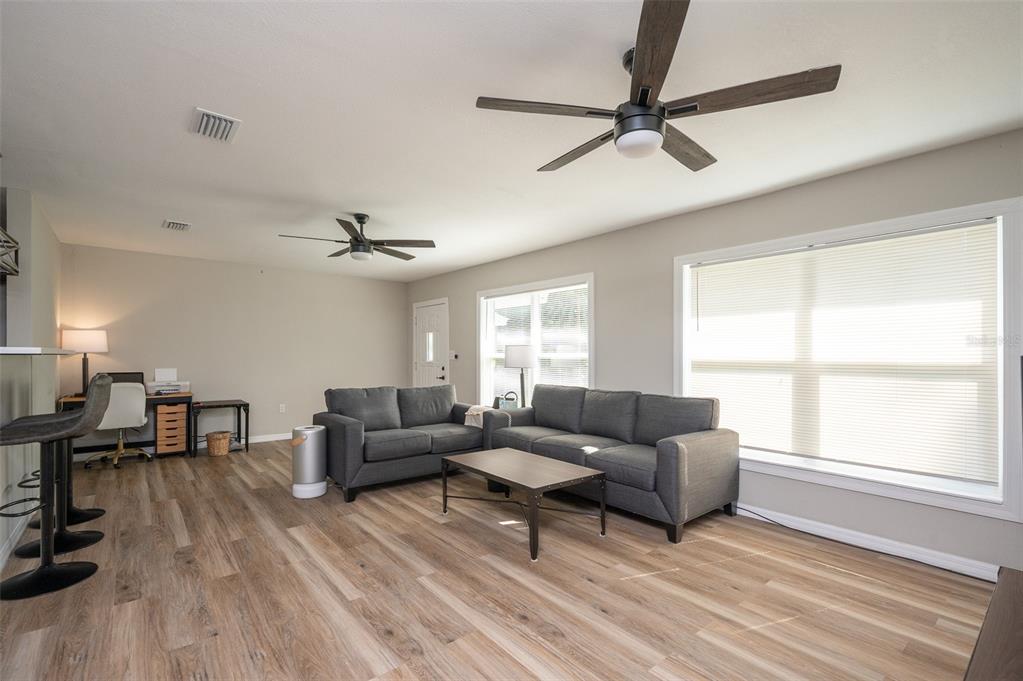 3806 Southwest 18th Street Gainesville, FL 32608 - Photo 4 of 14 a living room with furniture and a window