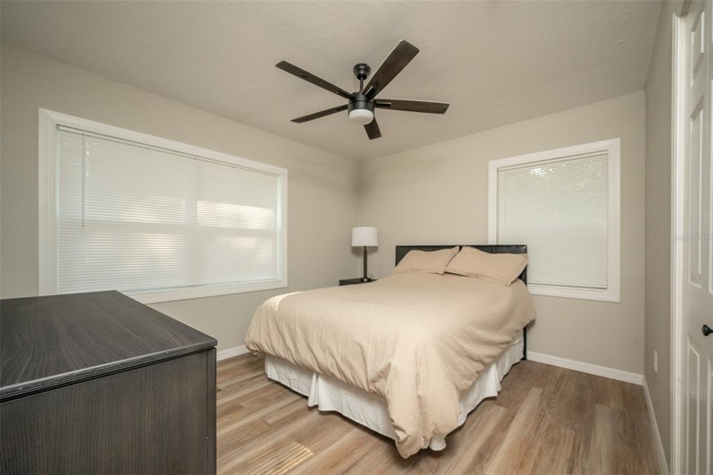 3806 Southwest 18th Street Gainesville, FL 32608 - Photo 9 of 14 a bedroom with a bed and window