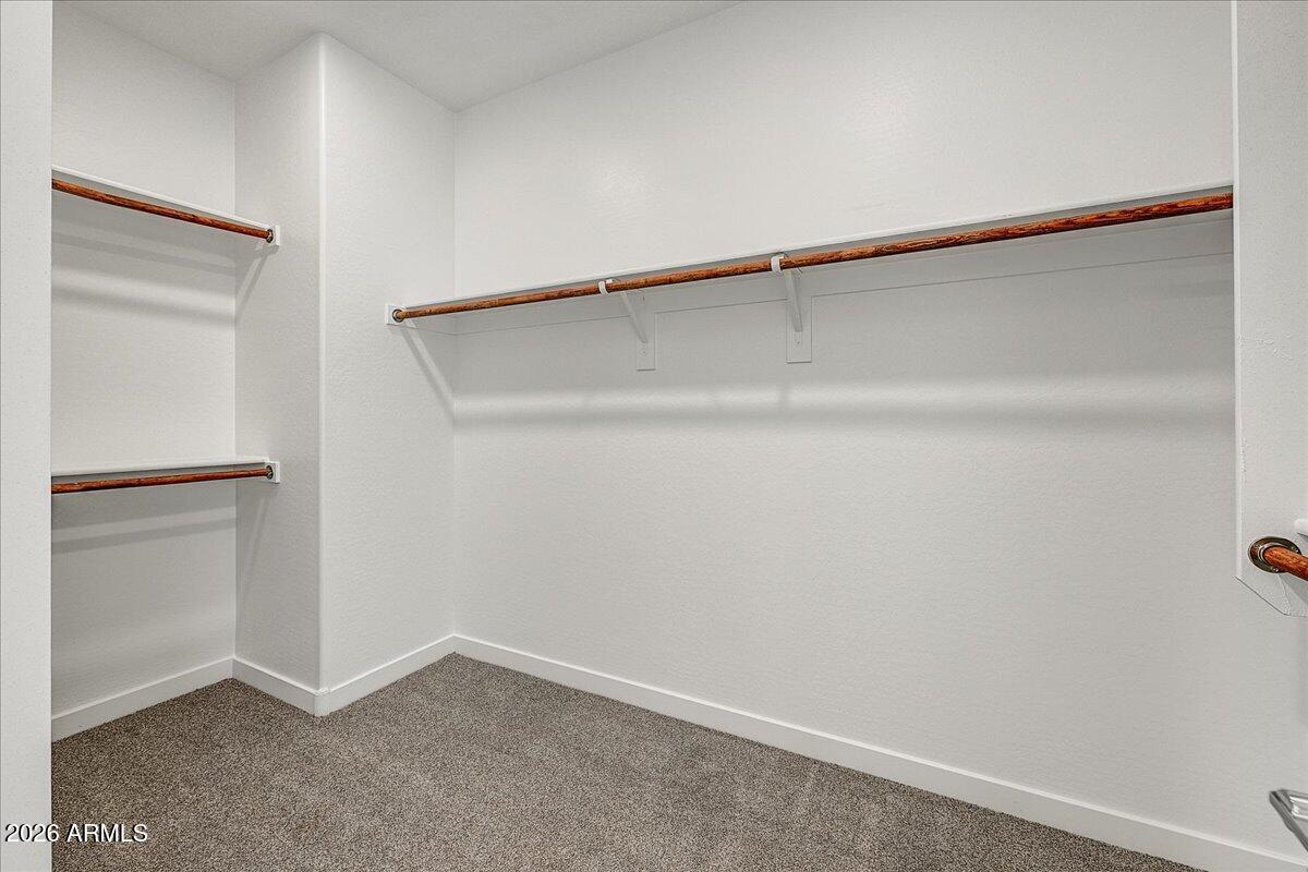 1642 West Monte Way Phoenix, AZ 85041 - Photo 11 of 20 a view of an empty walk in closet