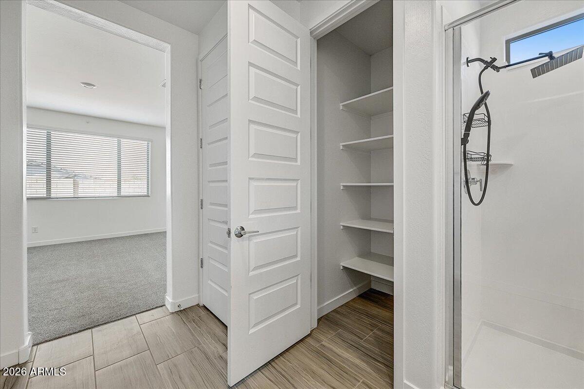 1642 West Monte Way Phoenix, AZ 85041 - Photo 13 of 20 a view of a walk in closet