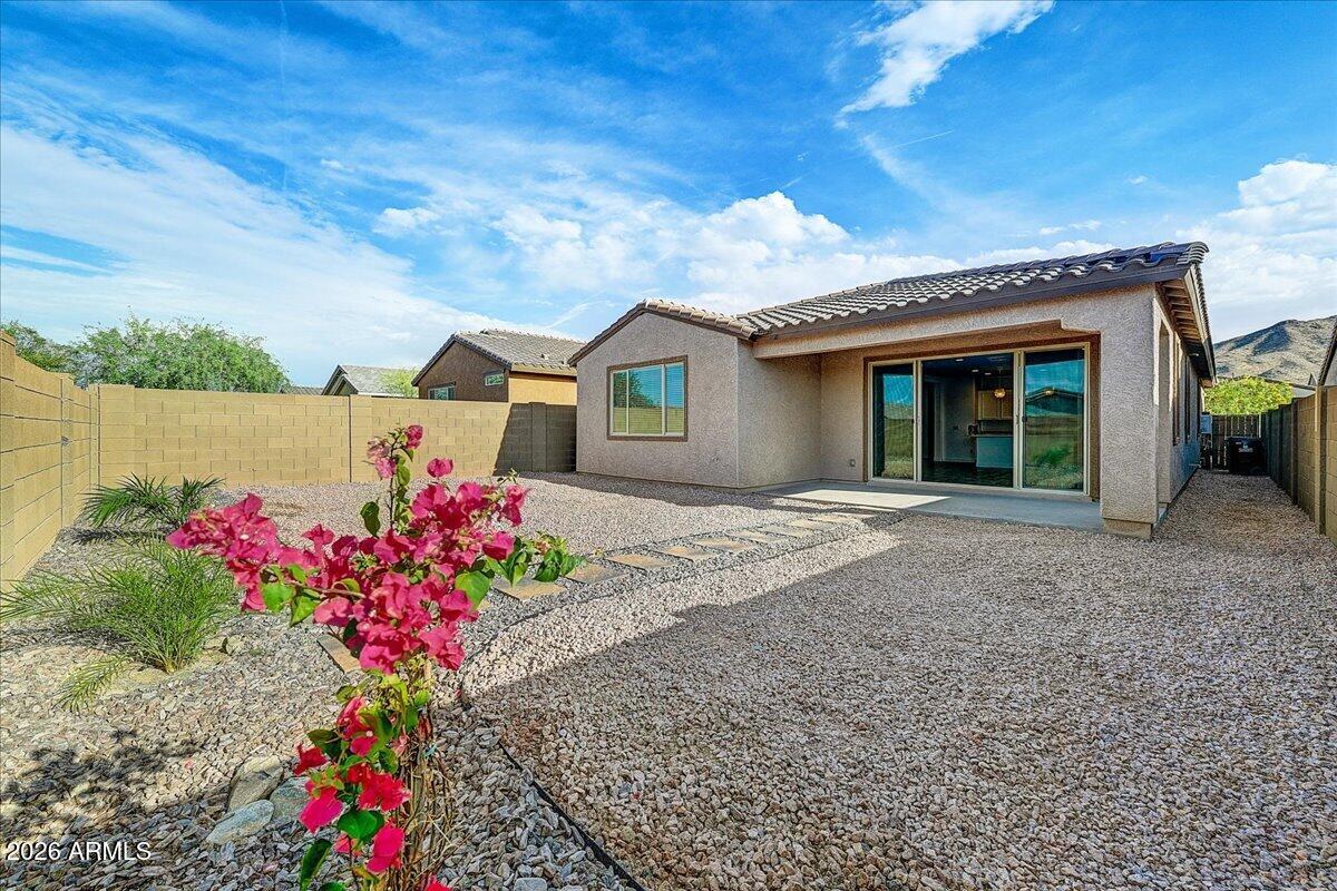 1642 West Monte Way Phoenix, AZ 85041 - Photo 20 of 20 a front view of a house with a yard