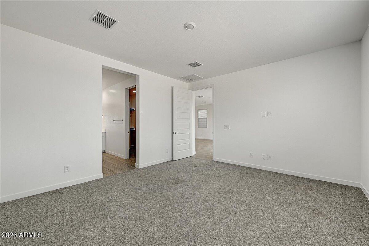 1642 West Monte Way Phoenix, AZ 85041 - Photo 10 of 20 a view of an empty room
