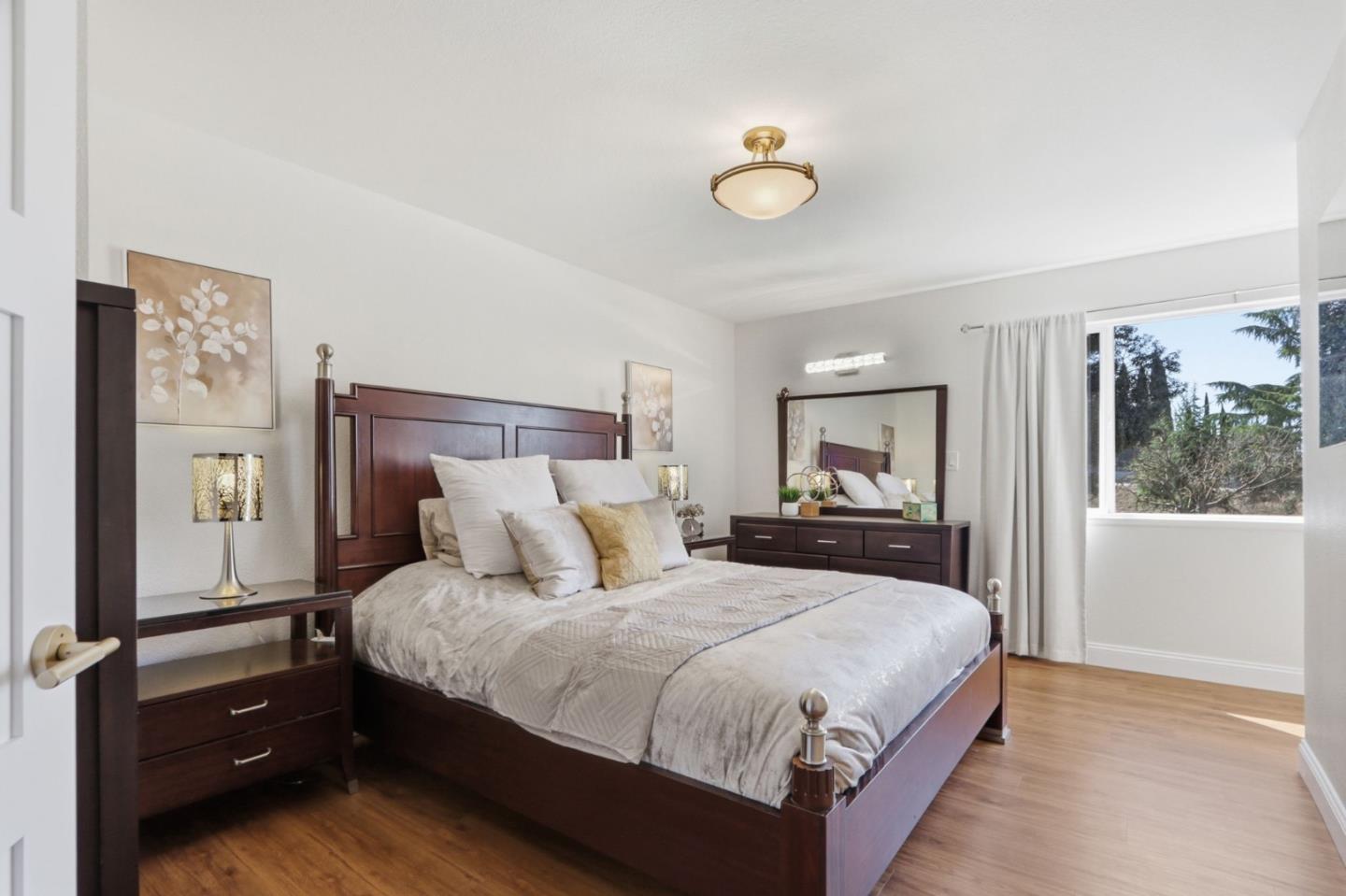 5888 Lean Way San Jose, CA 95123 - Photo 32 of 54 a bedroom with a bed and window