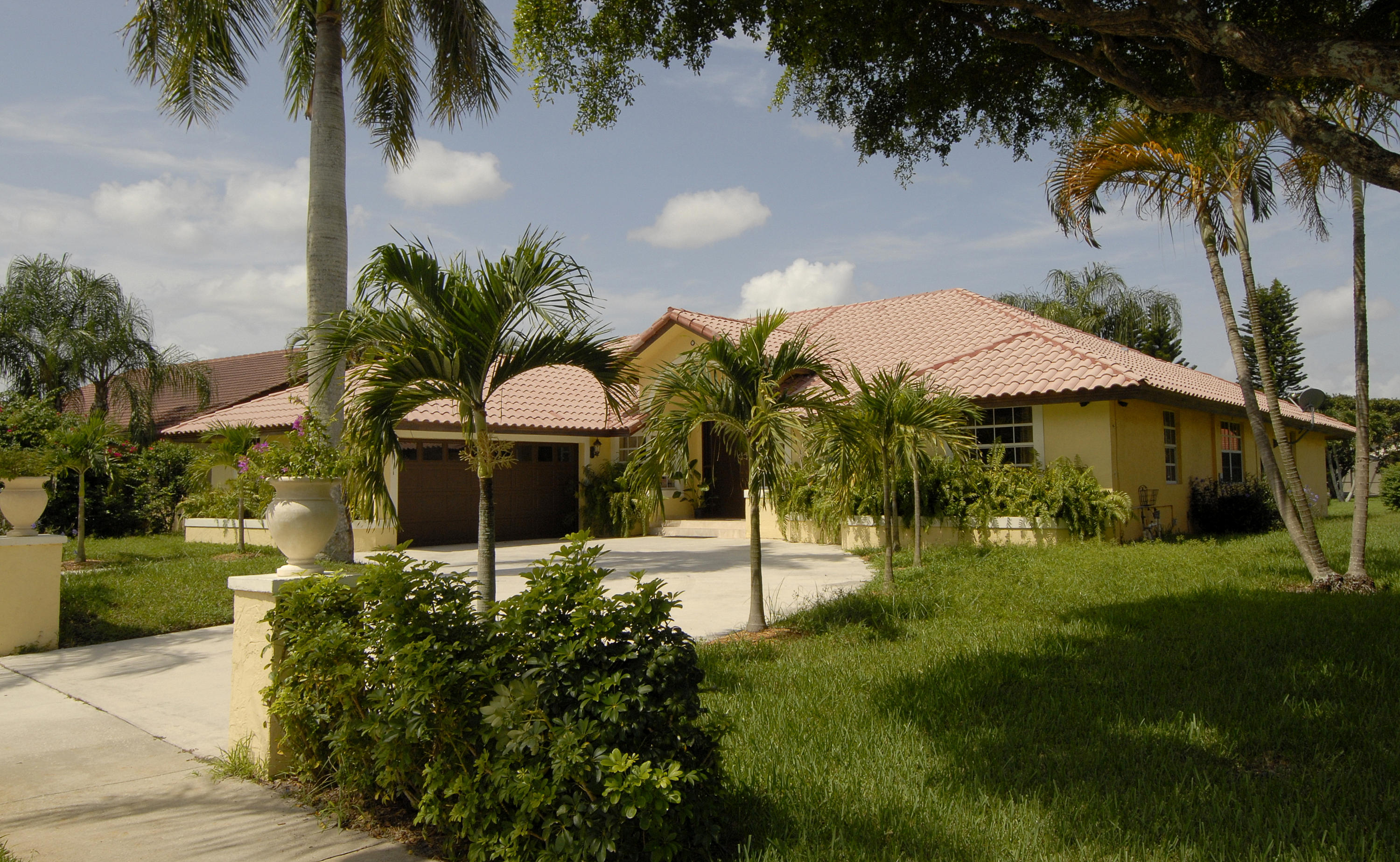 21347 Chinaberry Drive Boca Raton, FL 33428 - Photo 1 of 35 a swimming pool with outdoor seating and yard