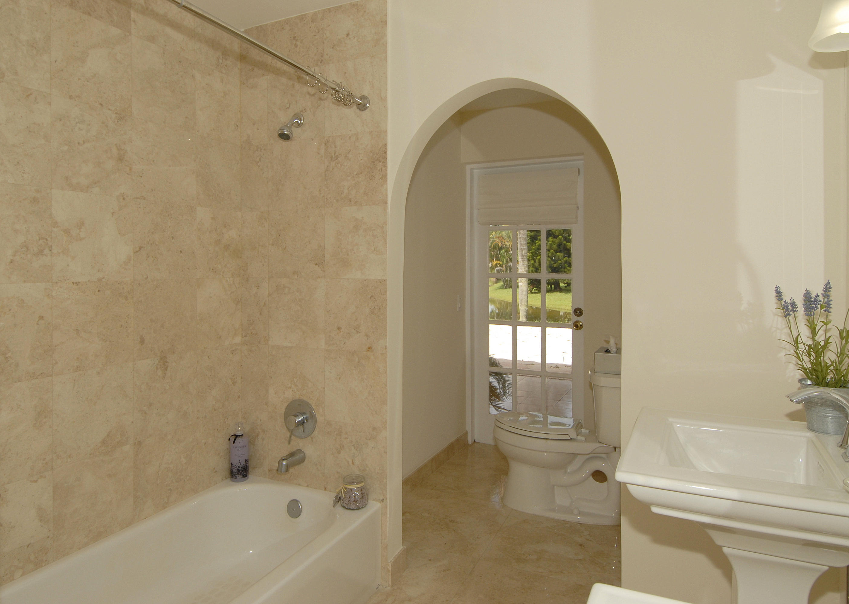 21347 Chinaberry Drive Boca Raton, FL 33428 - Photo 15 of 35 a bathroom with a sink and a bathtub