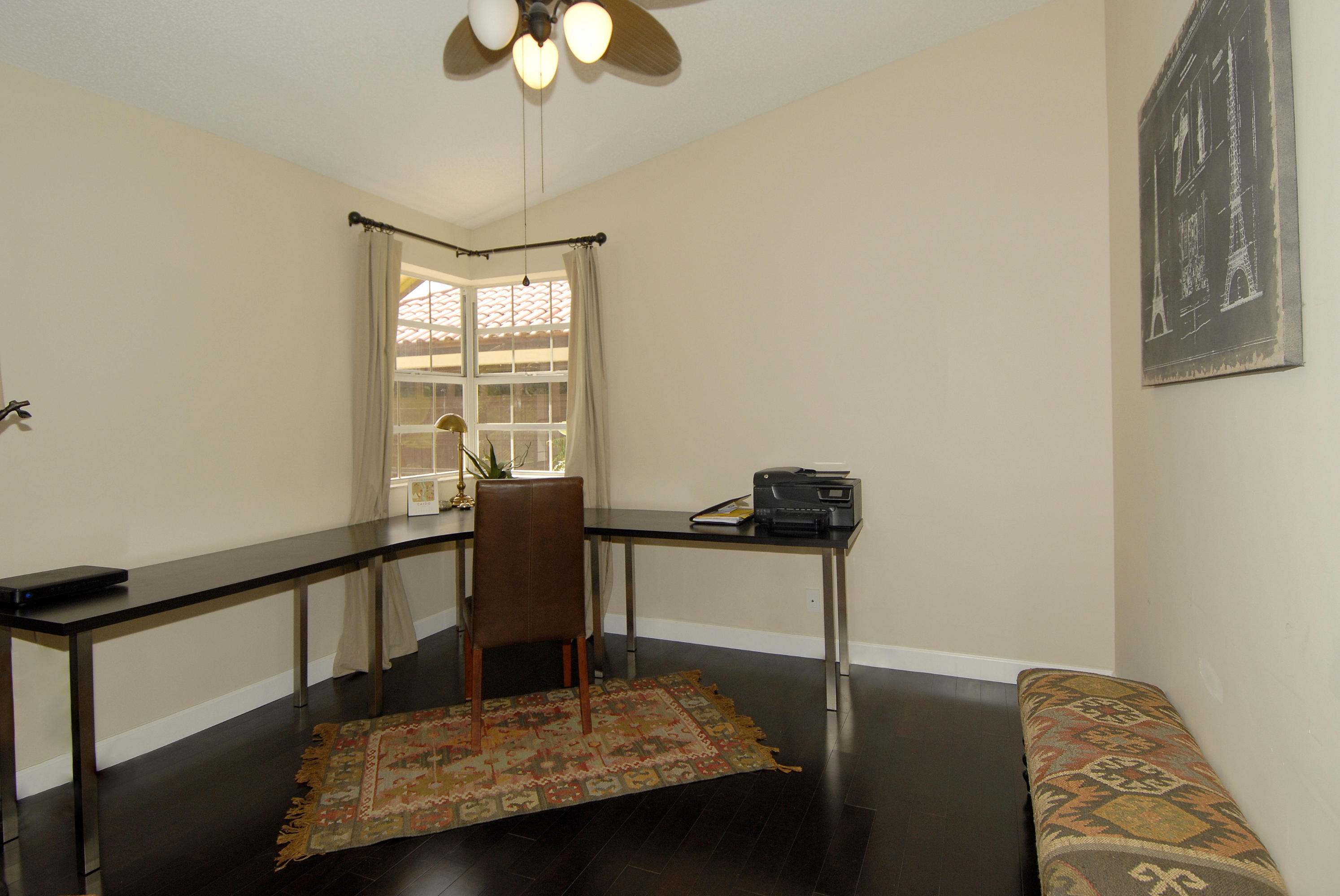 21347 Chinaberry Drive Boca Raton, FL 33428 - Photo 16 of 35 a view of a hallway with furniture and window