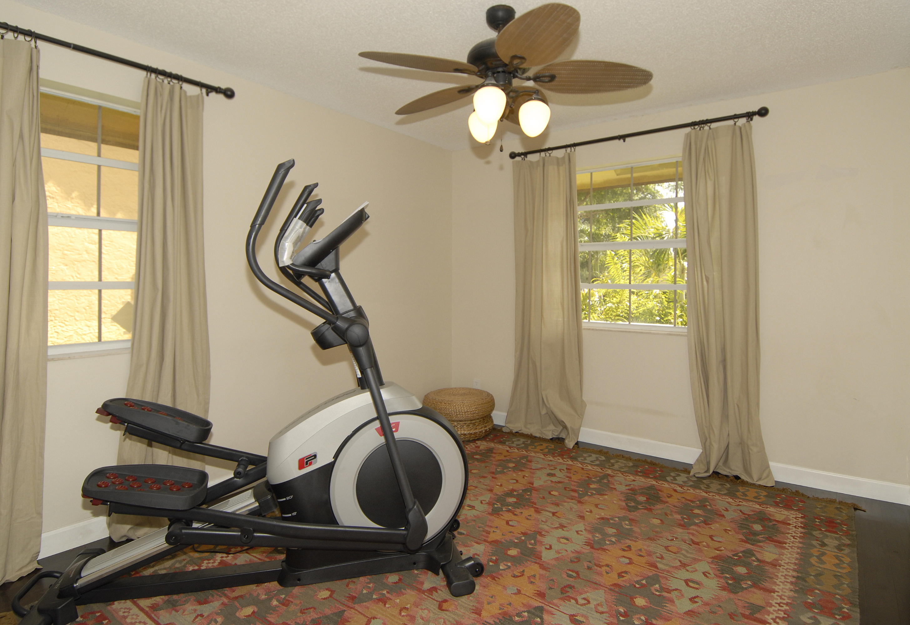 21347 Chinaberry Drive Boca Raton, FL 33428 - Photo 18 of 35 a view of a room with gym equipment