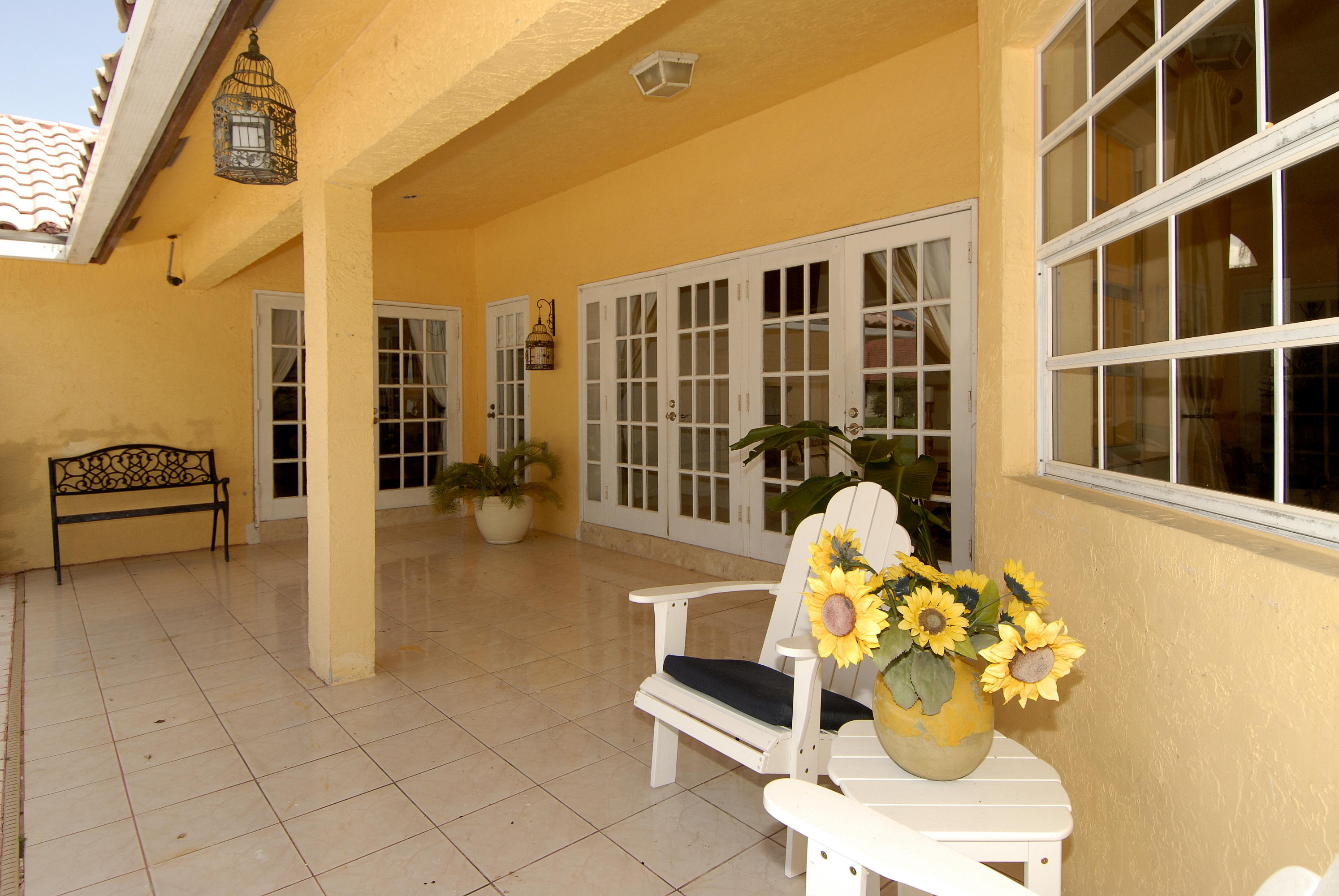 21347 Chinaberry Drive Boca Raton, FL 33428 - Photo 28 of 35 a lobby with furniture and floor to ceiling window