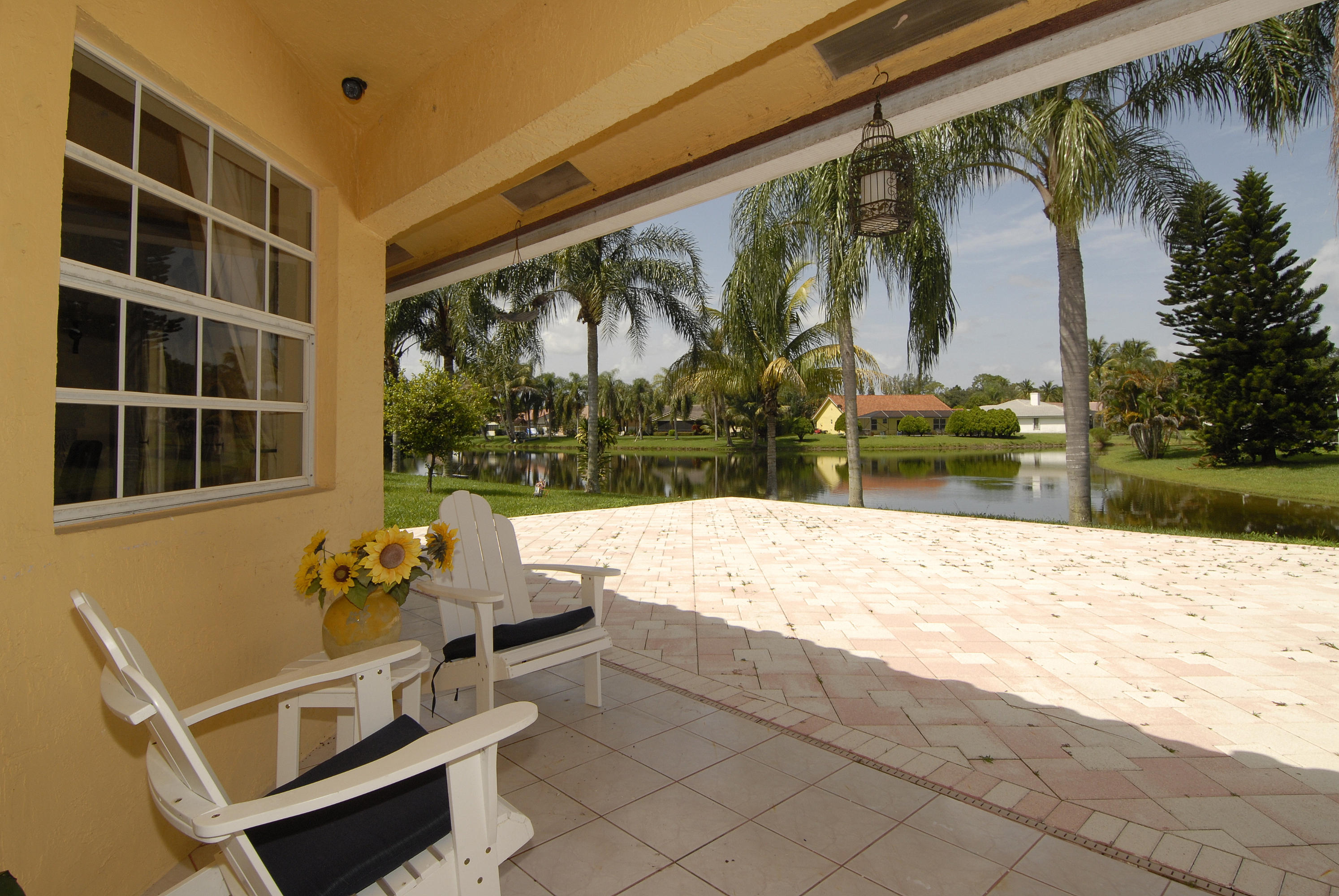 21347 Chinaberry Drive Boca Raton, FL 33428 - Photo 30 of 35 a view of swimming pool with a patio