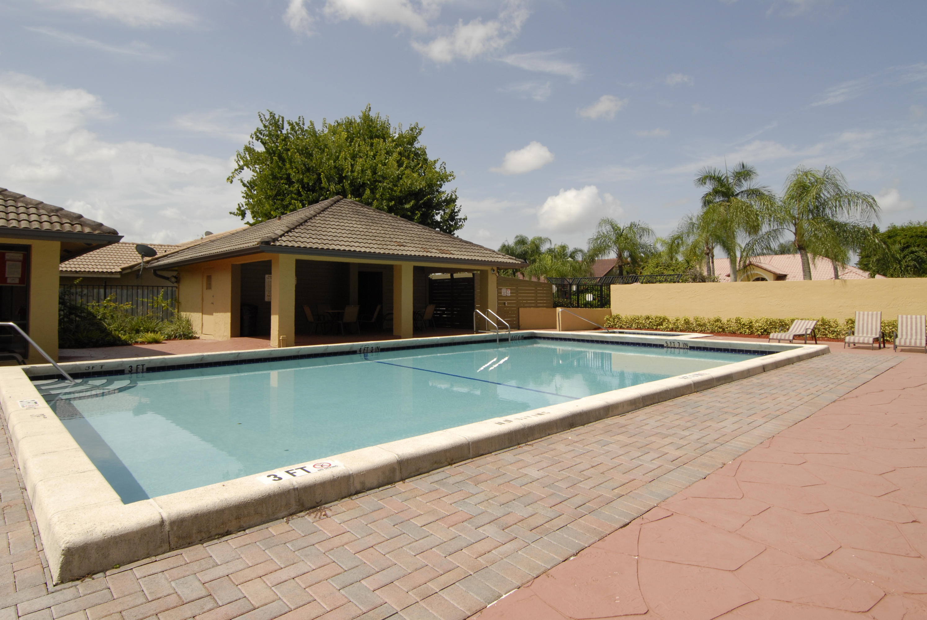 21347 Chinaberry Drive Boca Raton, FL 33428 - Photo 31 of 35 a view of swimming pool with a yard