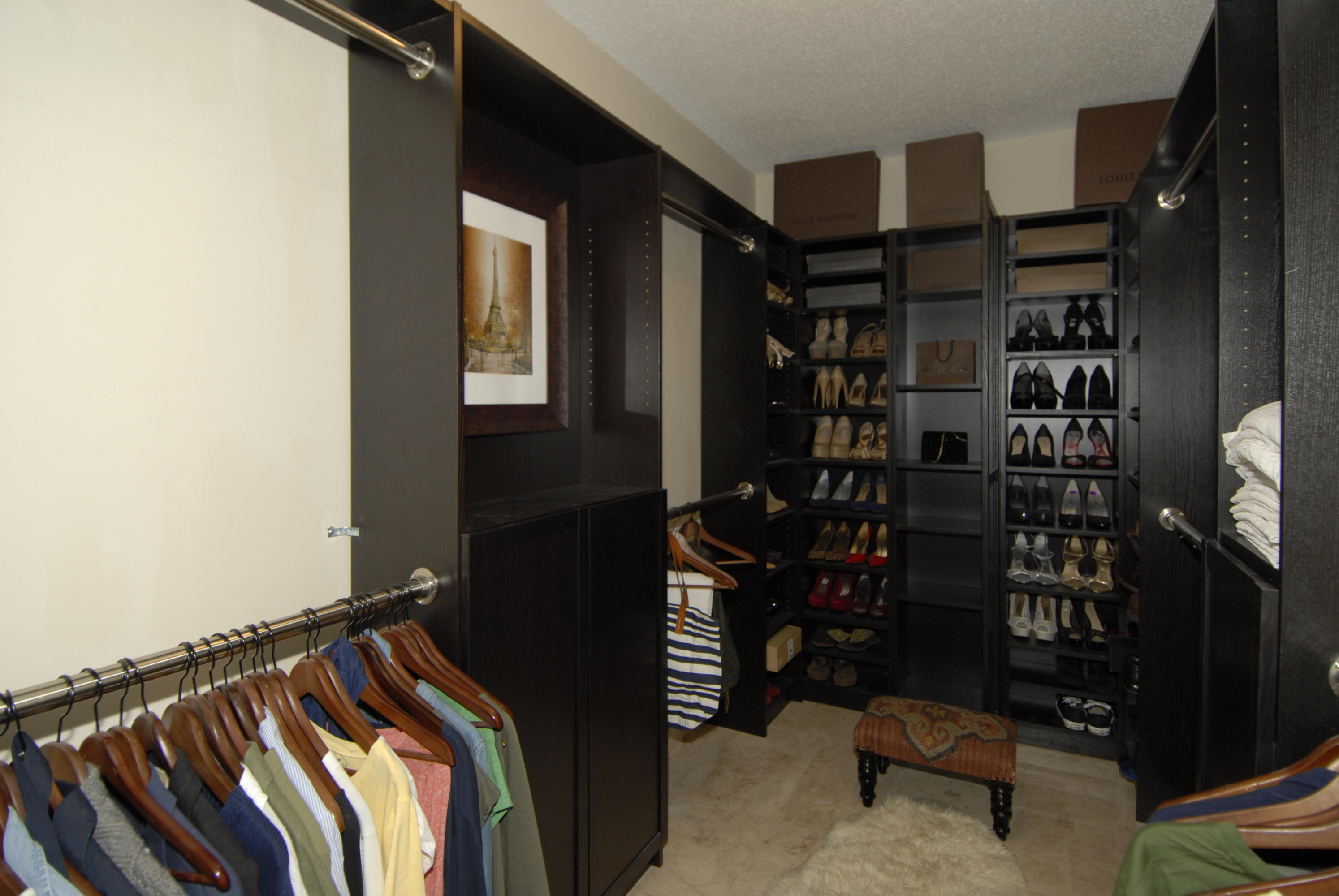 21347 Chinaberry Drive Boca Raton, FL 33428 - Photo 33 of 35 a view of walk in closet with clothes and shoes