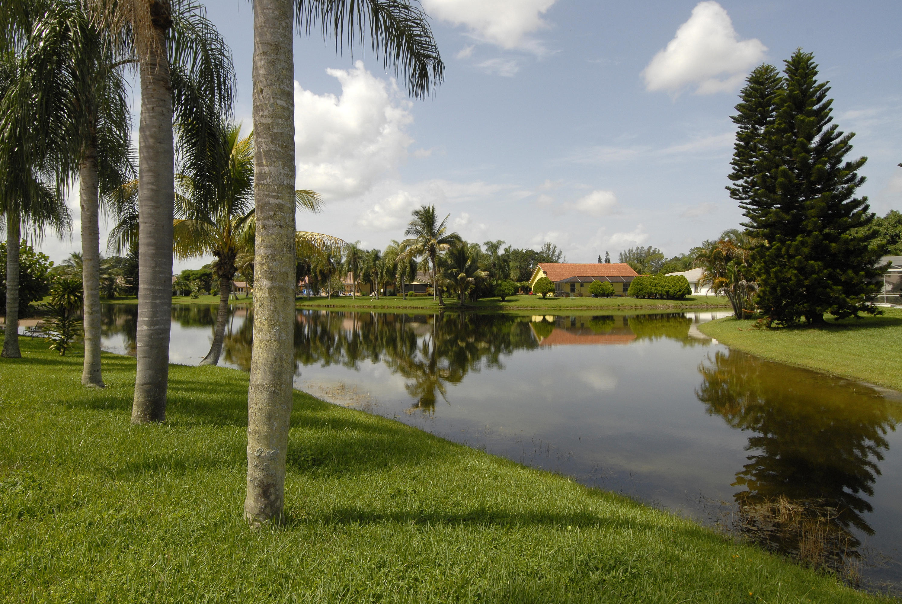 21347 Chinaberry Drive Boca Raton, FL 33428 - Photo 34 of 35 a lake view with a yard