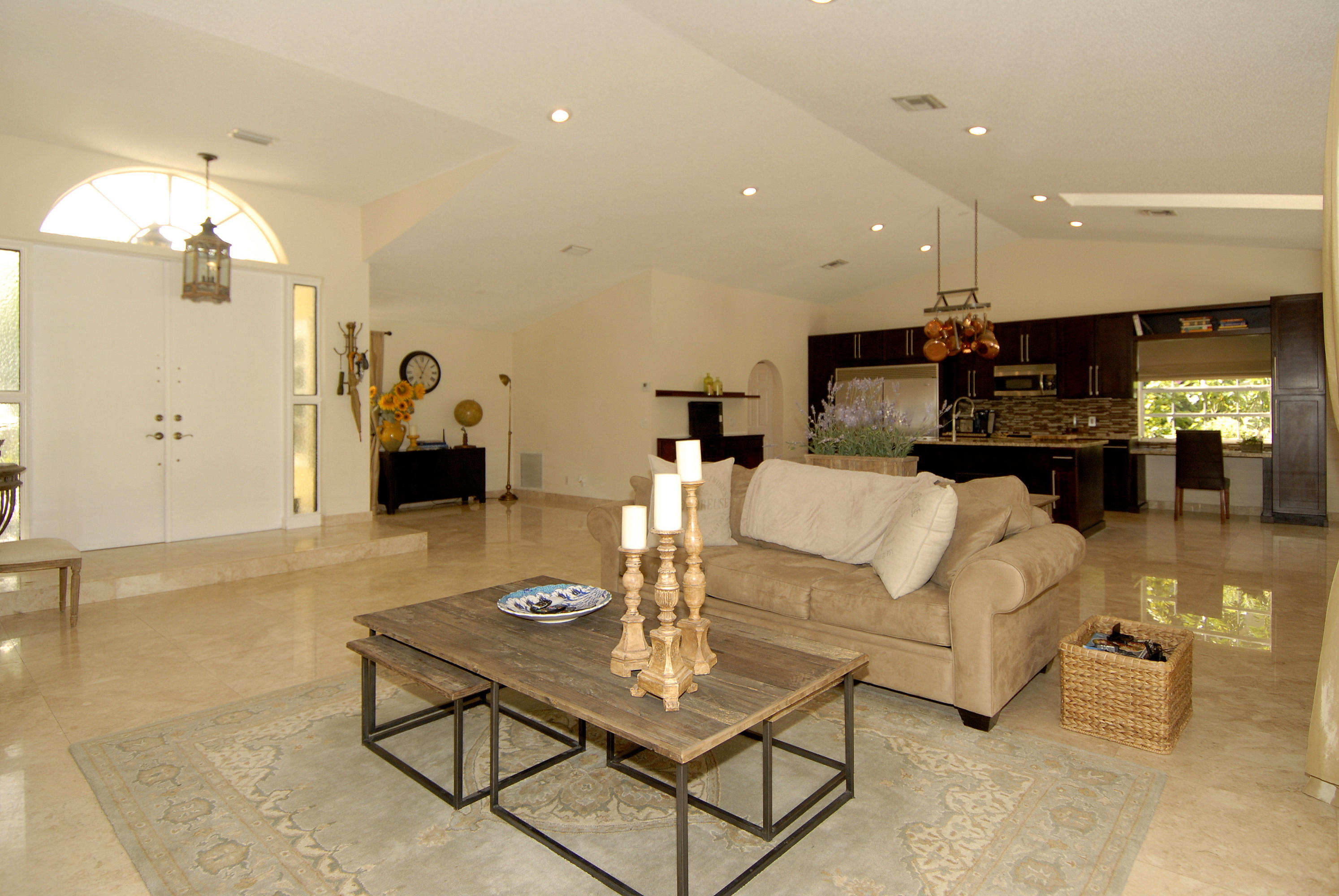 21347 Chinaberry Drive Boca Raton, FL 33428 - Photo 5 of 35 a living room with furniture and a chandelier