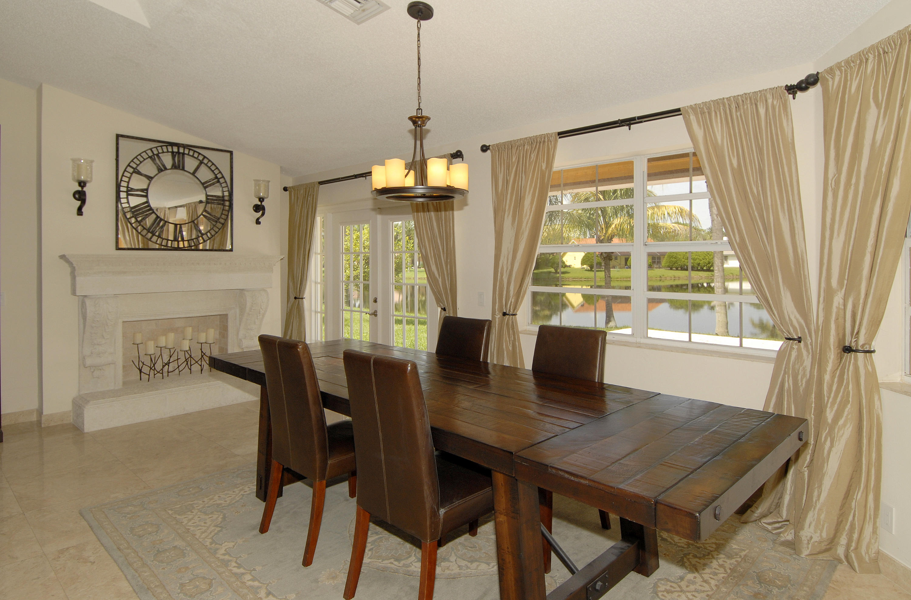 21347 Chinaberry Drive Boca Raton, FL 33428 - Photo 9 of 35 a view of a dining room with furniture window and wooden floor