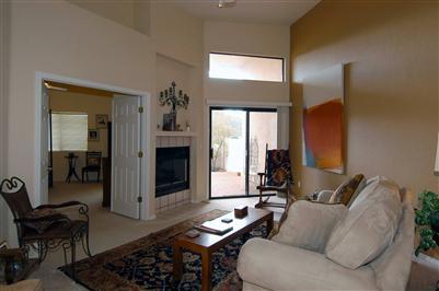 4992 North Valle Road Tucson, AZ 85750 - Photo 3 of 10 a living room with furniture and a window