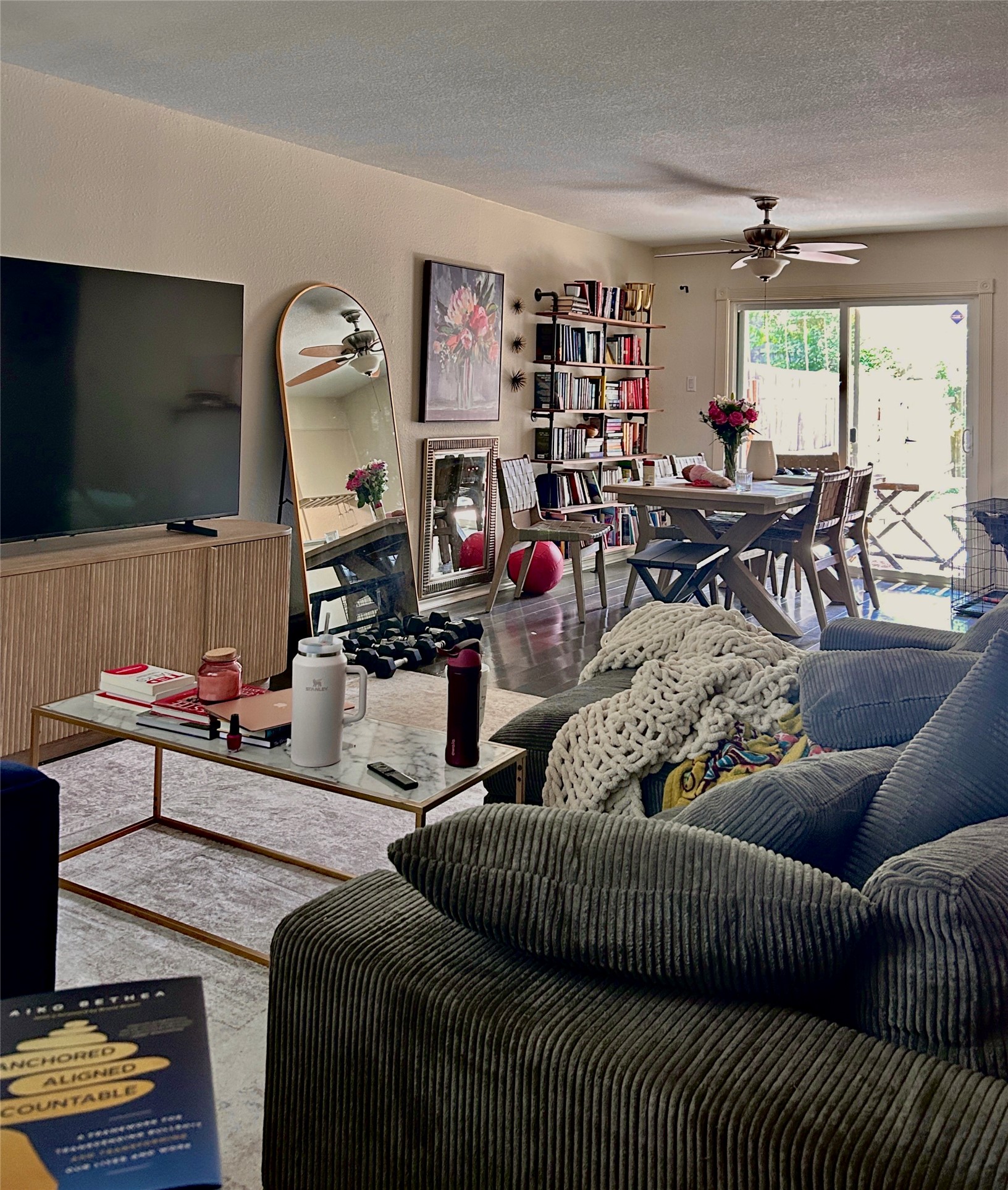 705 Castle Ridge Road, Unit C Austin, TX 78746 - Photo 15 of 15 An open floorplan seamlessly connects the comfortable living area with the dining space.