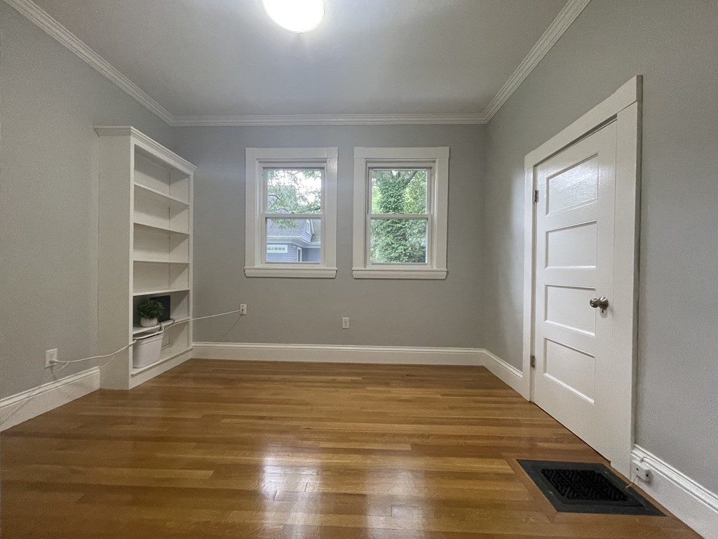116 Dickerman Road Newton, MA 02461 - Photo 15 of 40 wooden floor in an empty room with a window