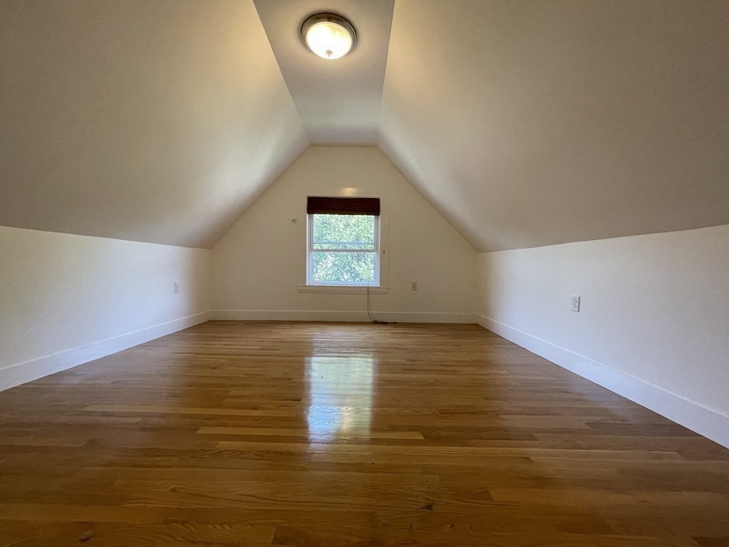 116 Dickerman Road Newton, MA 02461 - Photo 17 of 40 a view of a room with wooden floor and window