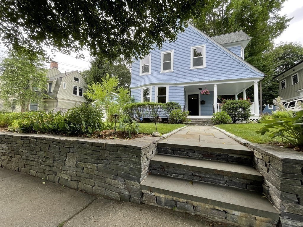 116 Dickerman Road Newton, MA 02461 - Photo 19 of 40 a front view of a house with a garden