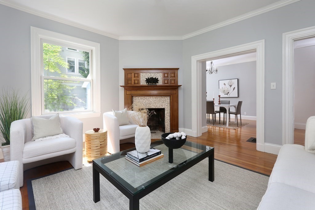 116 Dickerman Road Newton, MA 02461 - Photo 3 of 40 a living room with furniture a rug a window and a fireplace