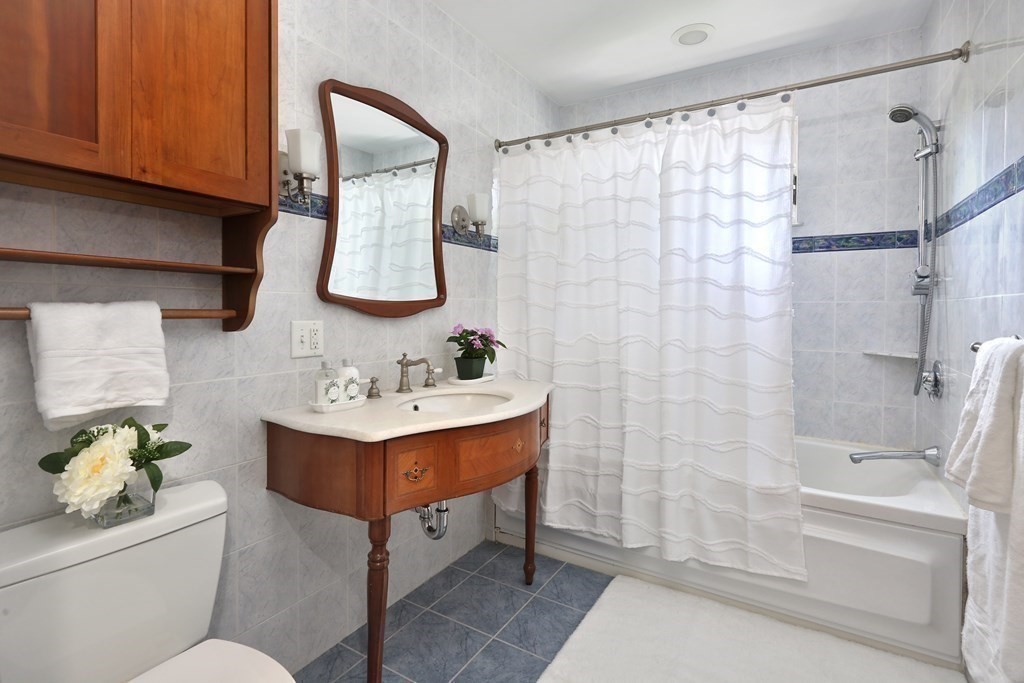 116 Dickerman Road Newton, MA 02461 - Photo 8 of 40 a bathroom with a sink toilet and shower