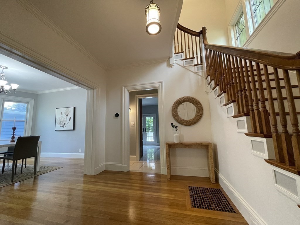 116 Dickerman Road Newton, MA 02461 - Photo 9 of 40 a view of a hallway with wooden floor and door