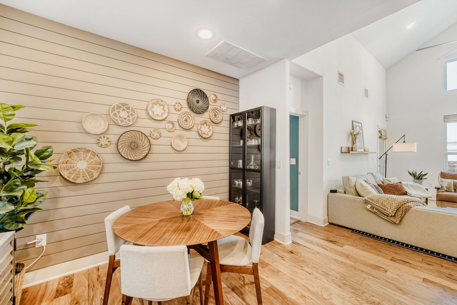 2000 Hermia Street Austin, TX 78741 - Photo 10 of 28 Dining area with wood finished floors, lofted ceiling, and recessed lighting