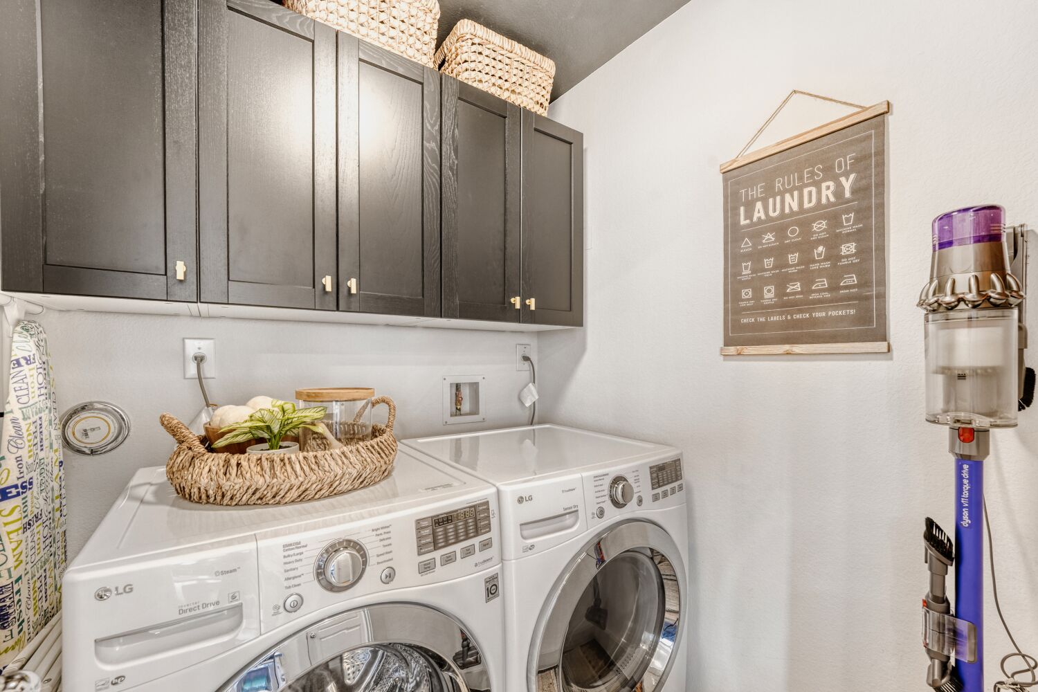 2000 Hermia Street Austin, TX 78741 - Photo 22 of 28 Laundry room featuring cabinet space and washer and clothes dryer