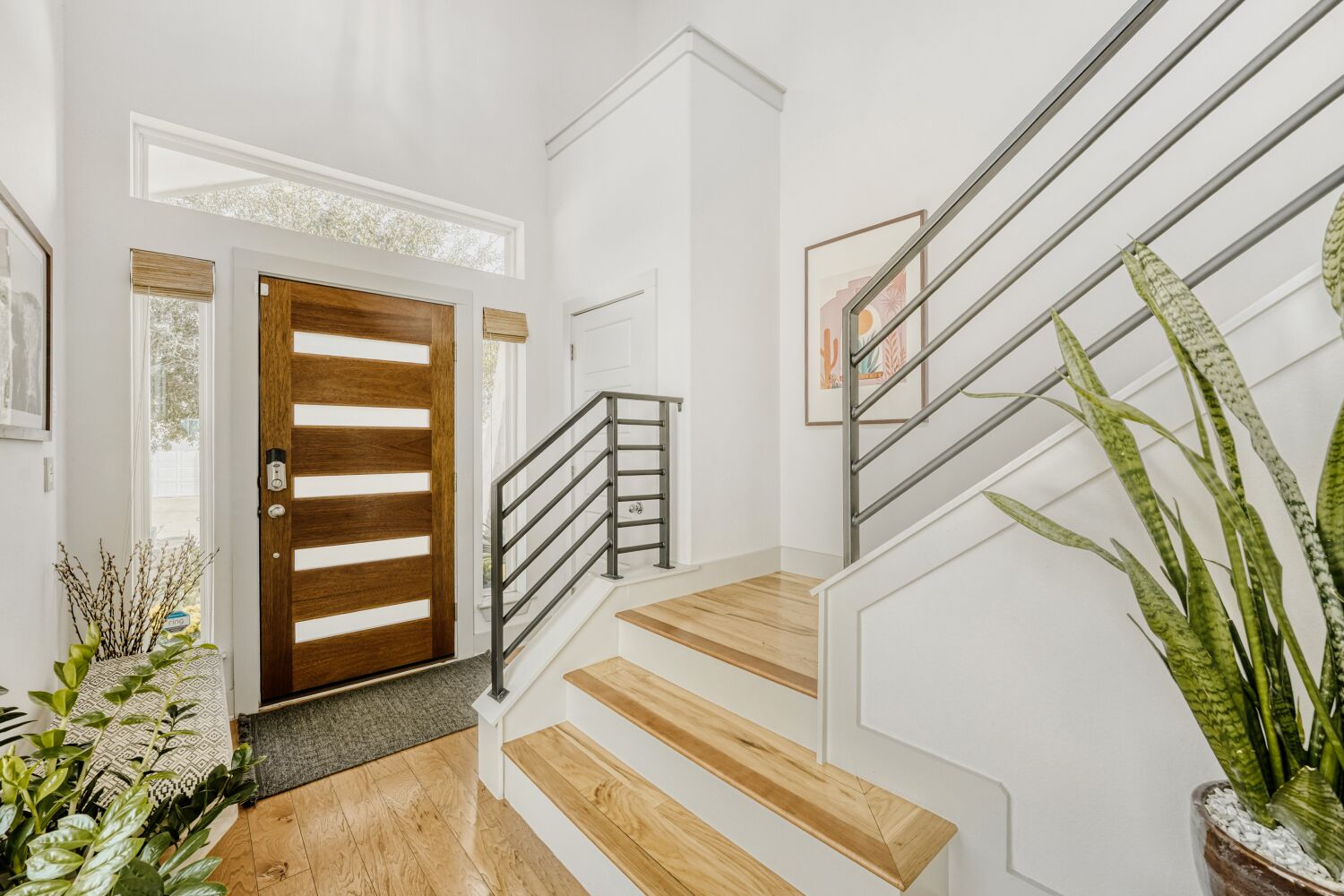 2000 Hermia Street Austin, TX 78741 - Photo 23 of 28 Entrance foyer featuring light wood-style floors and a high ceiling