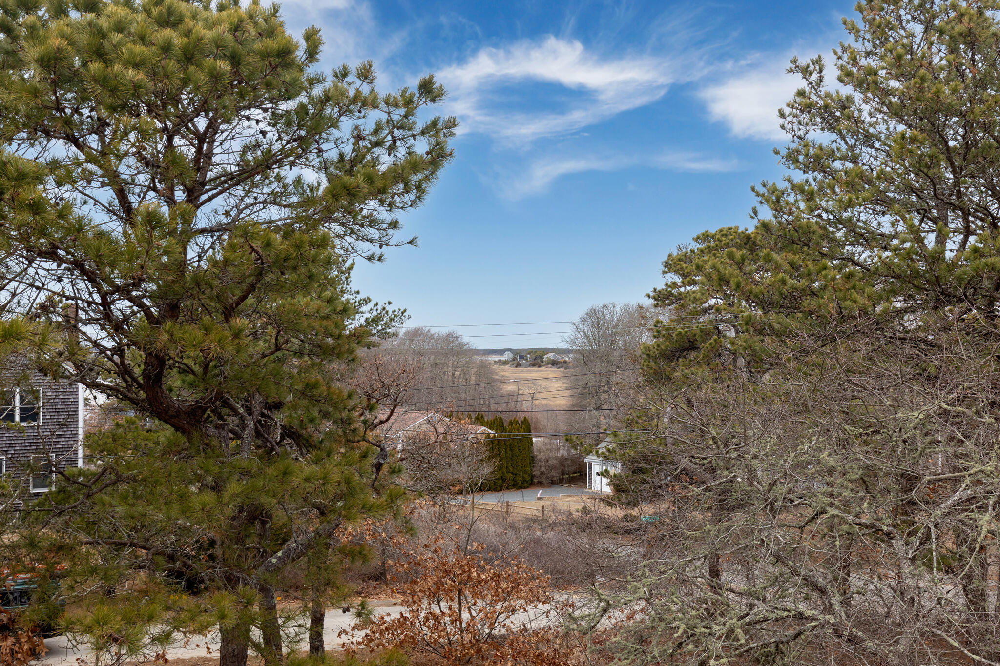 311 South Sunken Meadow Road Eastham, MA 02642 - Photo 37 of 57 a view of a house with a yard