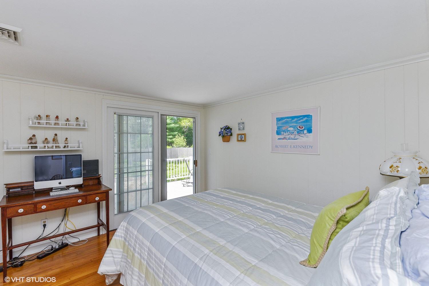 163 5 Corners Road Centerville, MA 02632 - Photo 11 of 21 a bedroom with a bed and a window