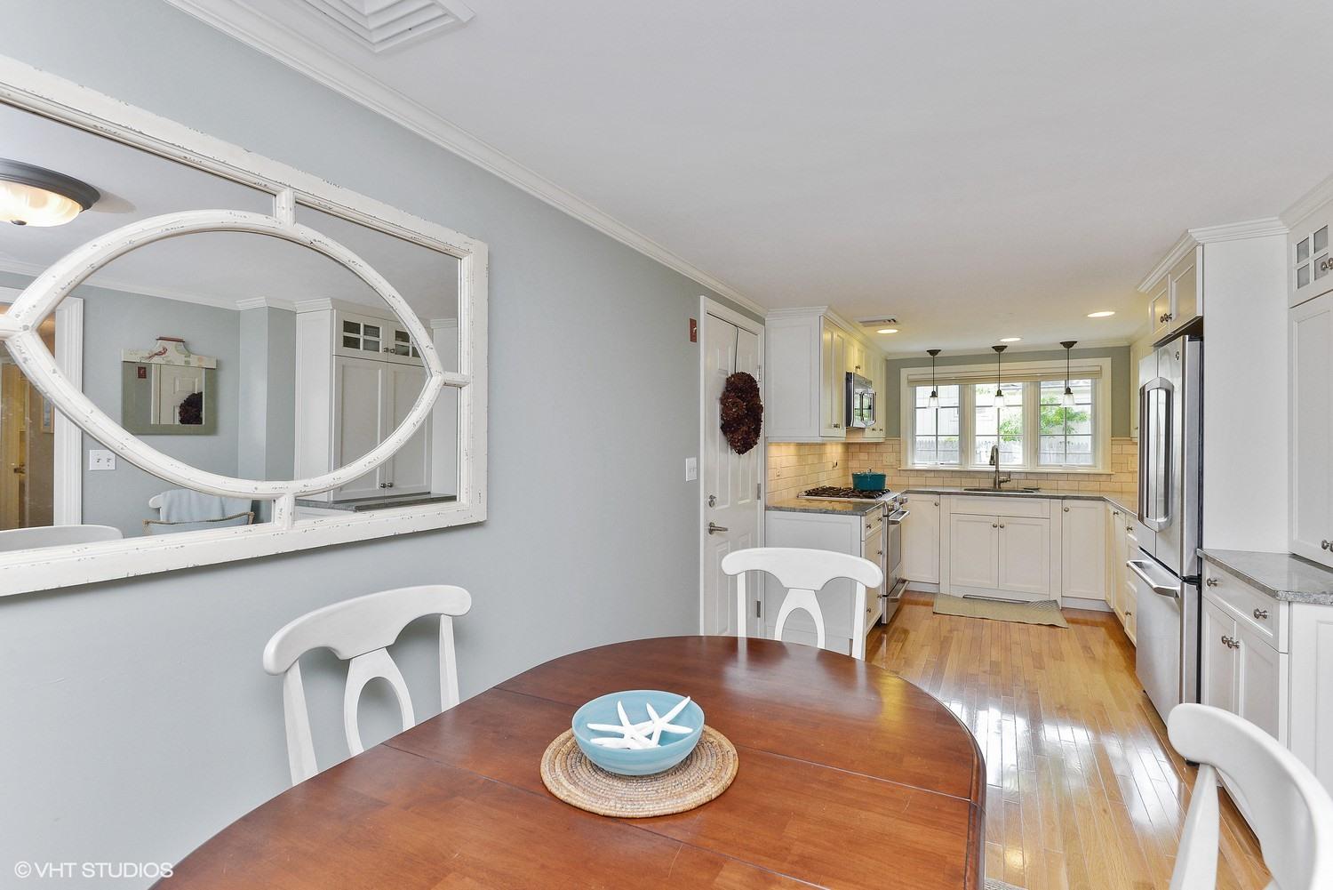 163 5 Corners Road Centerville, MA 02632 - Photo 5 of 21 a living room with furniture and a table