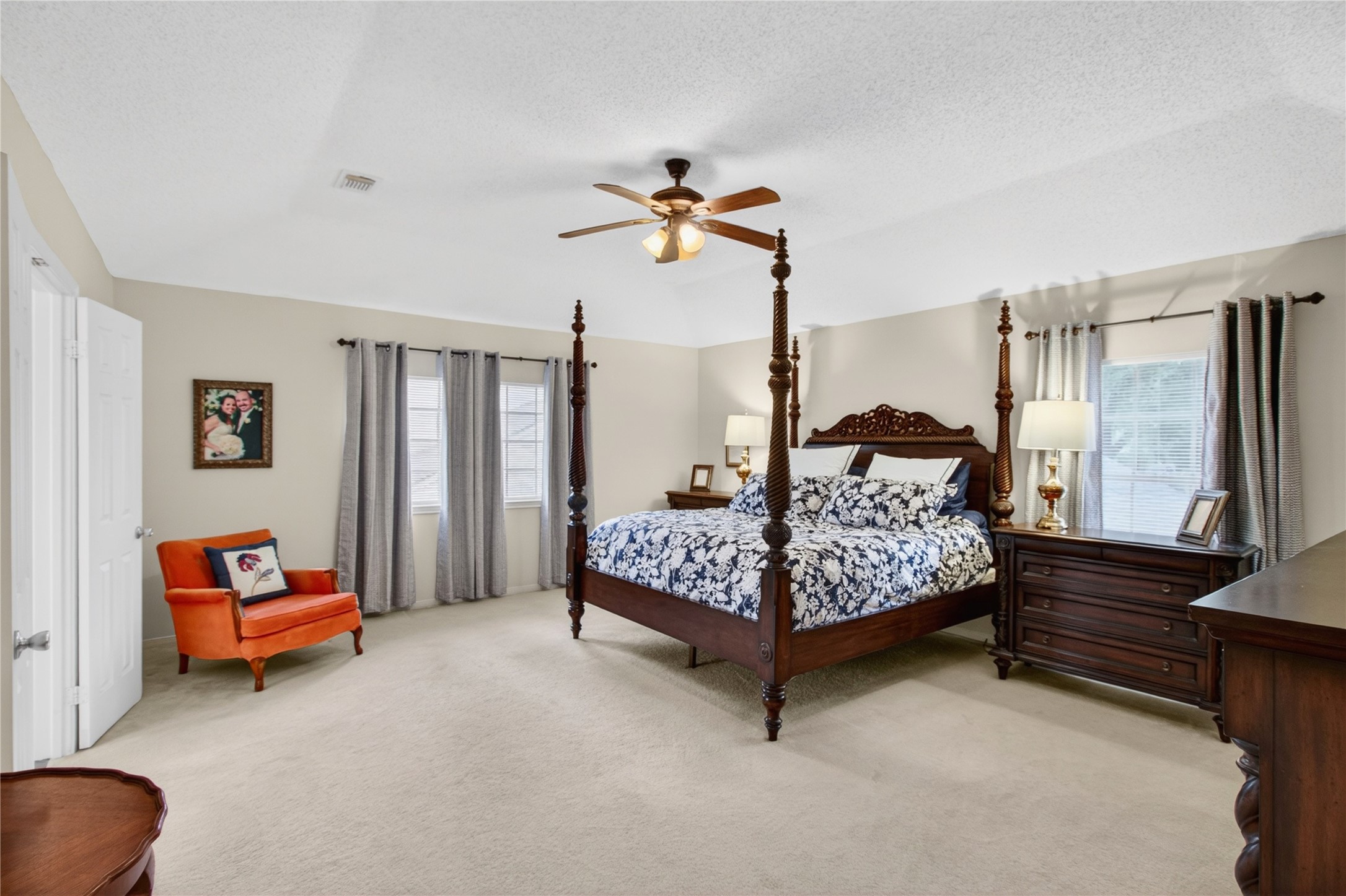 20214 Woodsboro Court Spring, TX 77388 - Photo 28 of 50 HUGE Primary Dream Suite! Plenty of room for your largest furniture! Gambrel Ceiling w/Recently updated Ceiling Fan! Double Doors lead to Ensuite Bath!