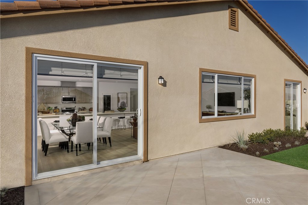9028 Carson Avenue Hesperia, CA 92344 - Photo 11 of 11 a dining room with furniture and a window